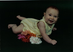 Domino, awake in a bed of roses